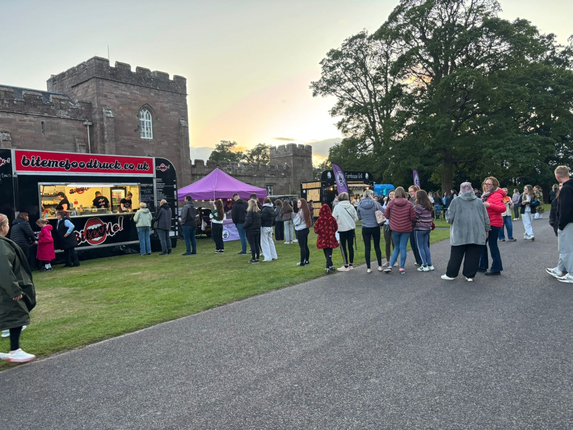 Bite Me food truck serving crowds at a castle event