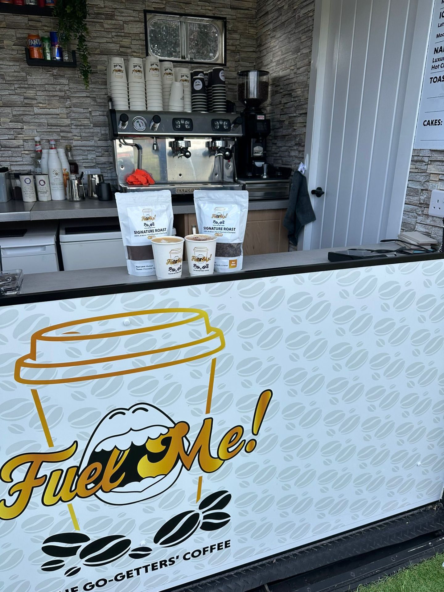 Fuel Me coffee trailer branded counter