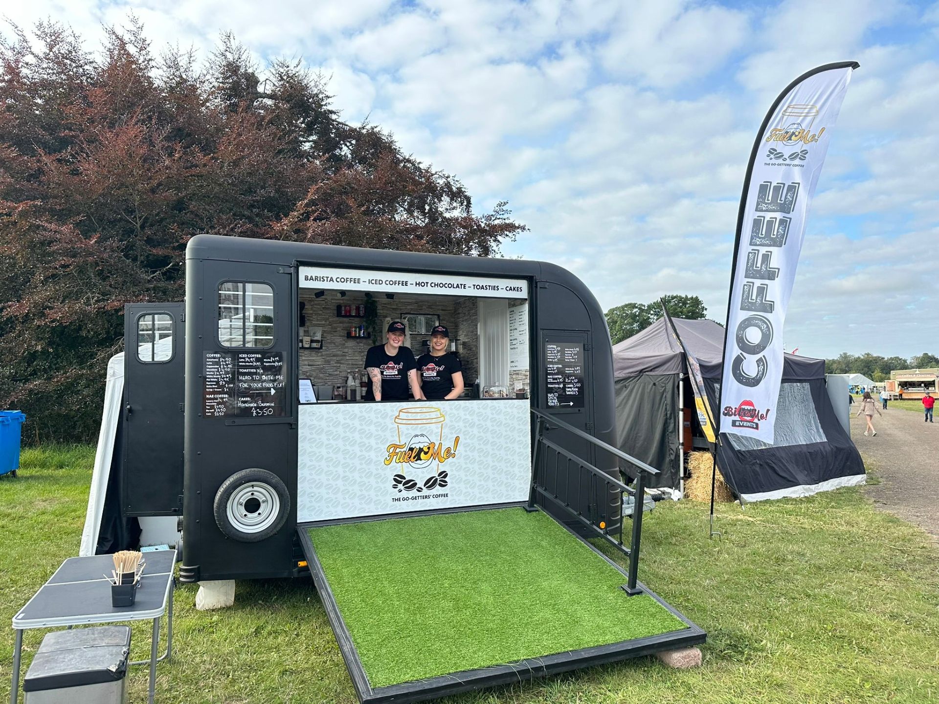 Fuel Me coffee trailer with baristas at an event
